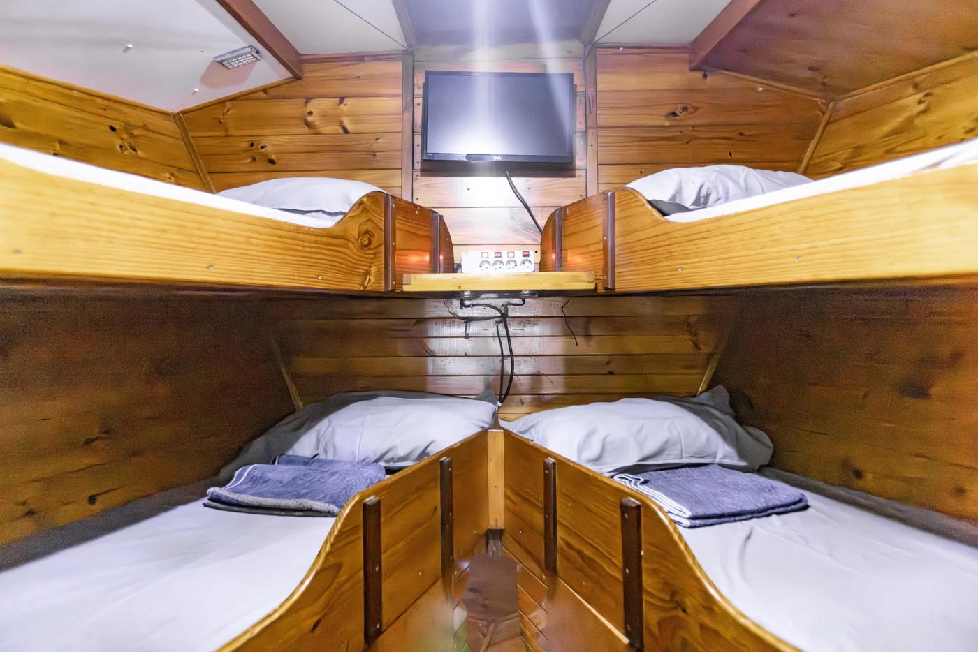 Timber-lined guest cabin with bunk beds